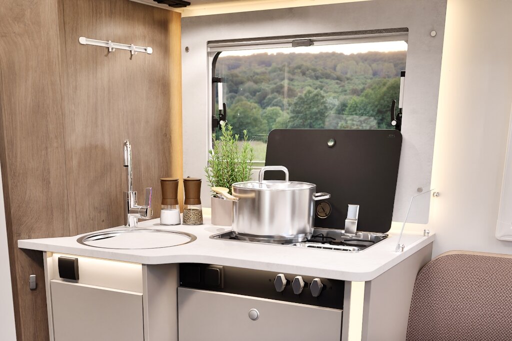 Carado motorhome kitchen with sink, gas hob, pot and window